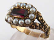 Appraisal: An antique yellow metal tests carat gold red stone and