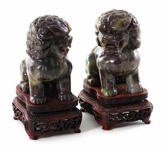 Appraisal: Pair Chinese carved jade shishi guardian lions late Qing Dynasty