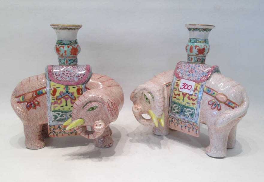 Appraisal: PAIR CHINESE PORCELAIN FIGURAL CANDLEHOLDERS elephants adorned in ceremonial costumes