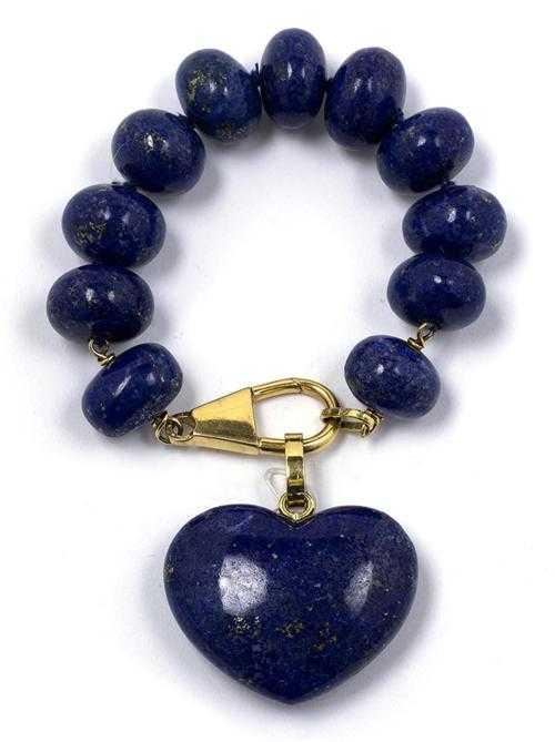 Appraisal: LAPISLAZULI-BRACELET MIT -ANH NGER Gelbgold Sehr dekoratives Bracelet aus abgeflachten