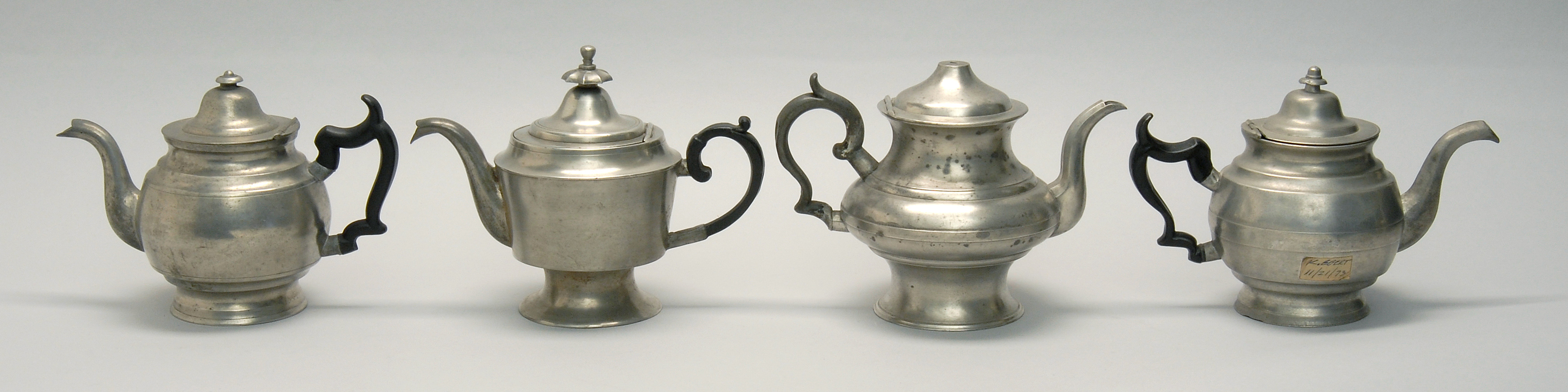 Appraisal: FOUR EARLY TH CENTURY AMERICAN PEWTER TEAPOTS one by William