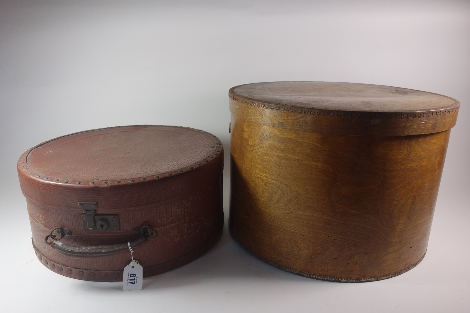 Appraisal: A ply-birch and metal edged circular hat box by Veneta