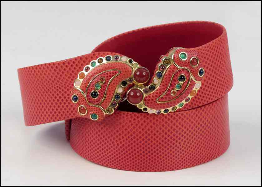 Appraisal: JUDITH LEIBER RED REPTILE SKIN BELT With a rhinestone paisley