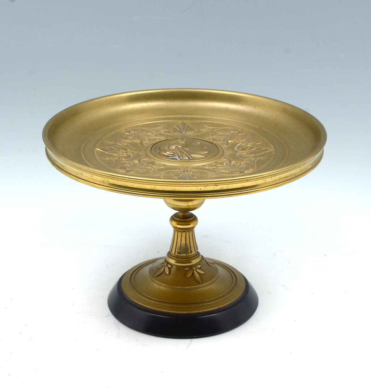 Appraisal: BRONZE FIGURAL TAZZA Heavy bronze tazza having a central Medallion