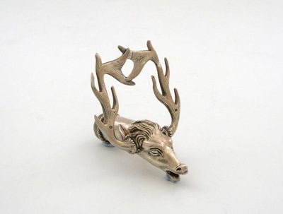 Appraisal: A Victorian novelty silver stag head tap the handle formed