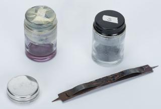 Appraisal: Four Miscellaneous Cheating Items Including a canister of silver sheen