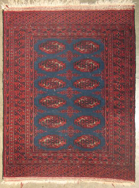 Appraisal: An Afghan rug size approximately ft in x ft in