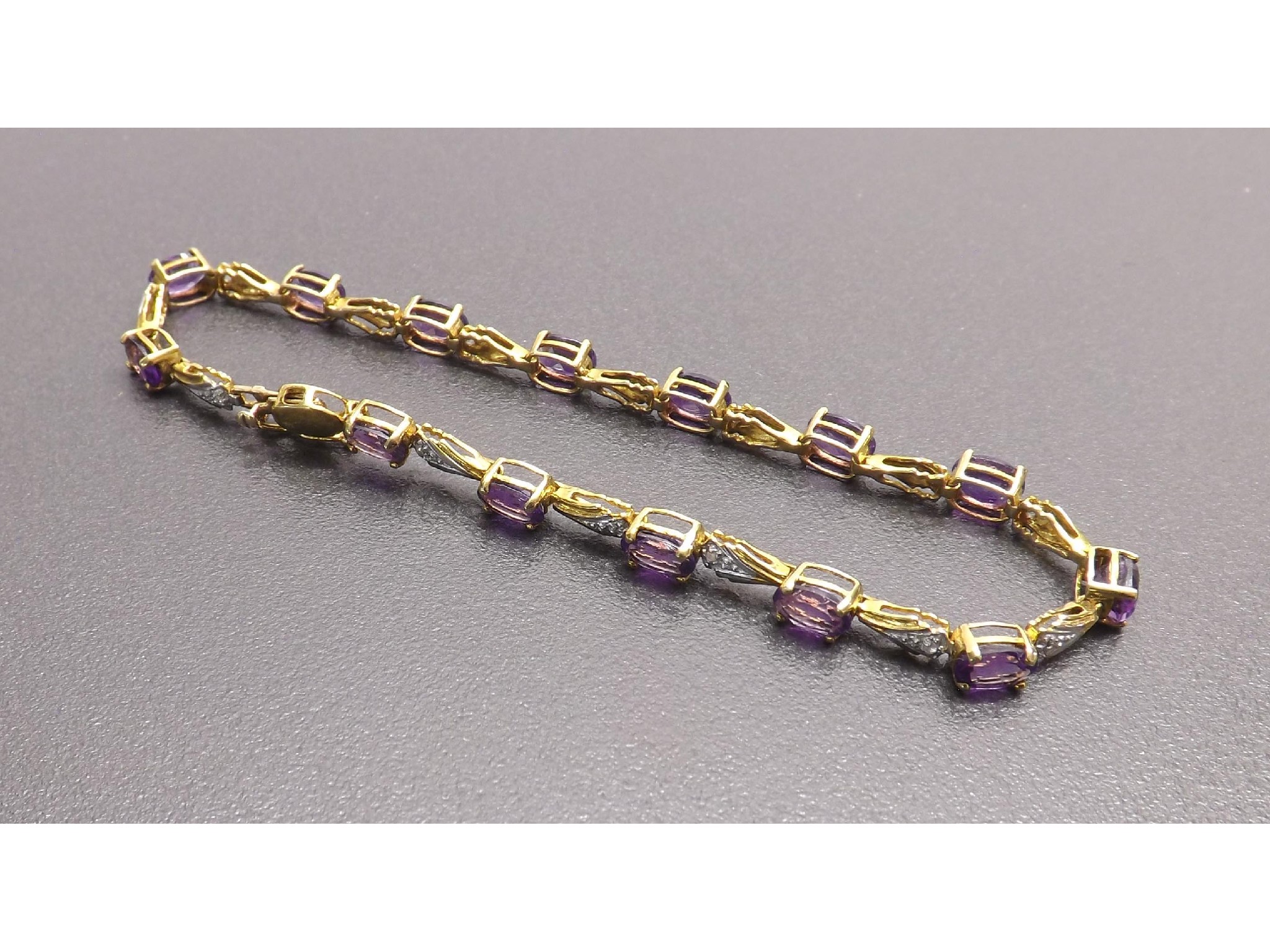 Appraisal: Amethyst and diamond bracelet gm