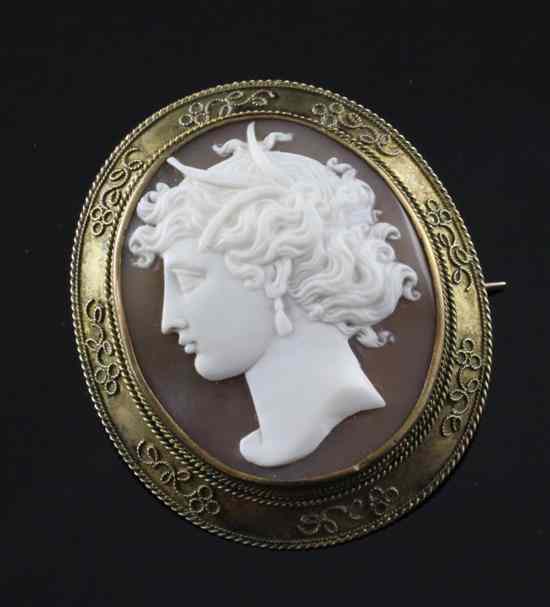 Appraisal: A Victorian gold mounted oval cameo brooch carved with the