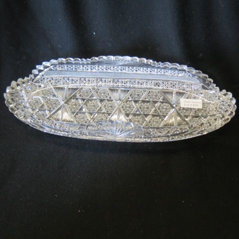 Appraisal: Cut Glass Celery Dish elaborate design with panels of starbursts