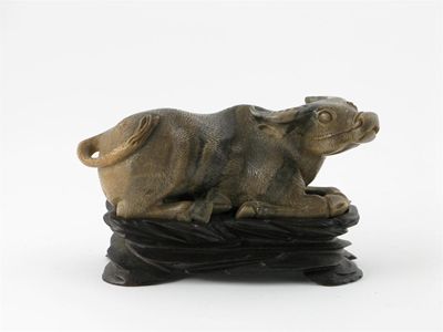 Appraisal: A Chinese soapstone model of a recumbent water buffalo the