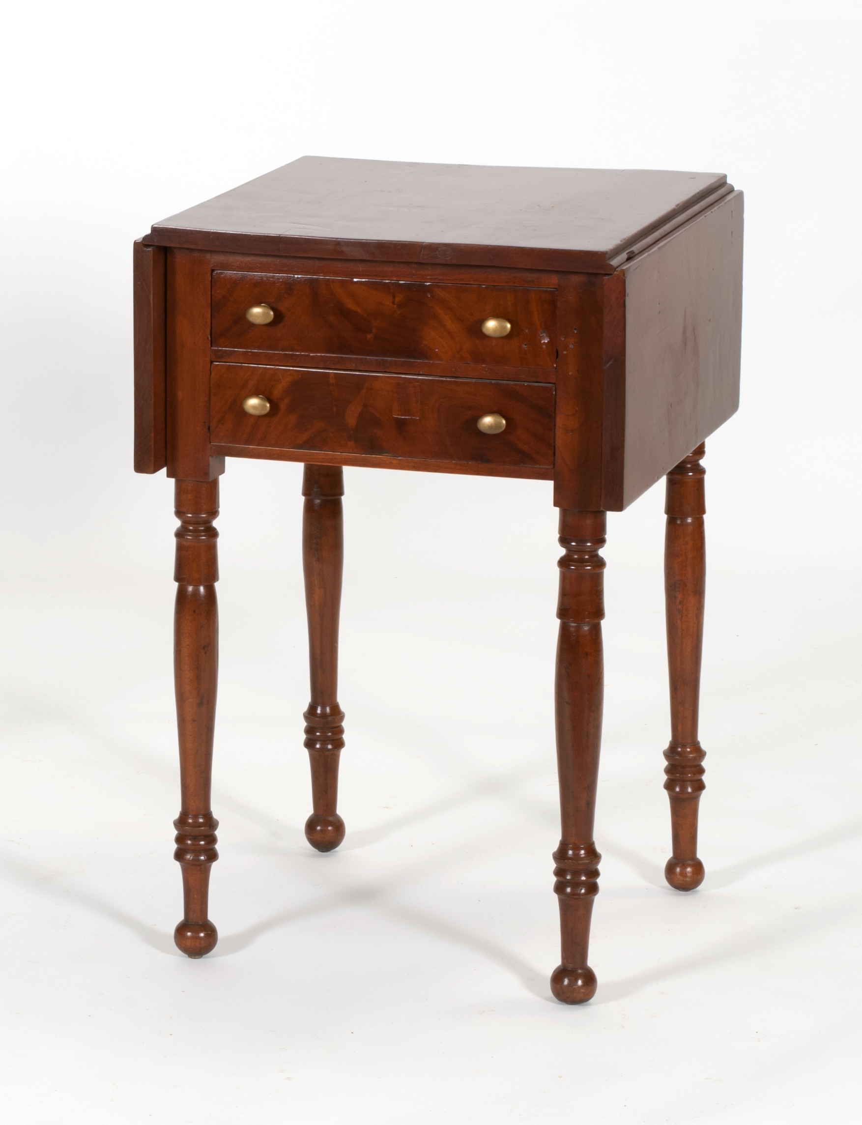 Appraisal: CIRCA AMERICAN SHERATON DROP-LEAF STAND in cherry with two drawers