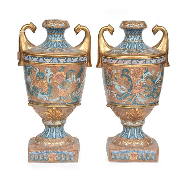 Appraisal: A PAIR OF ENAMELLED AND GILT PORCELAIN URNS CM HIGH