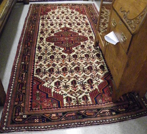 Appraisal: PERSIAN AREA RUG Hamadan tribal central geometric medallion and overall