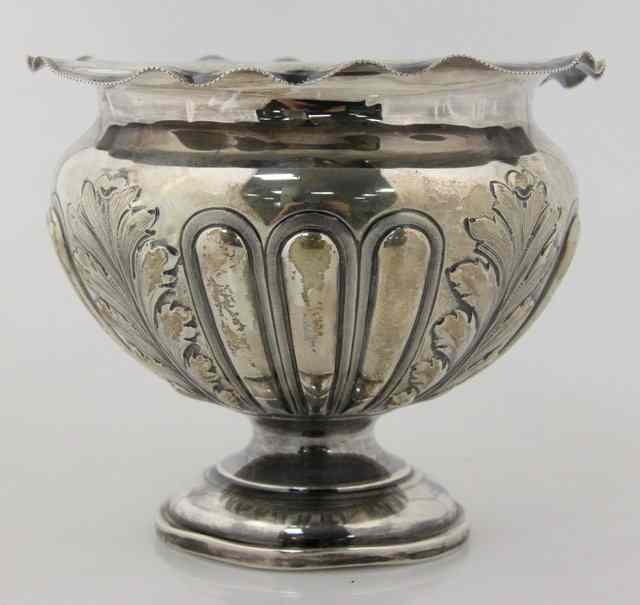 Appraisal: A silver rose bowl Walker Hall Sheffield embossed with leaves