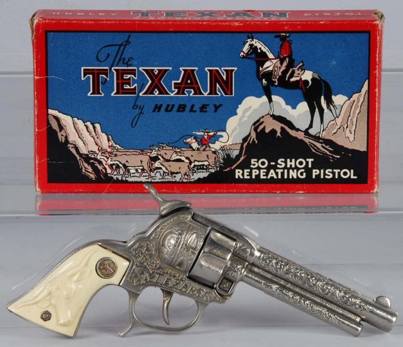 Appraisal: Cast Iron Hubley Texan Cap Gun Description Includes box Condition