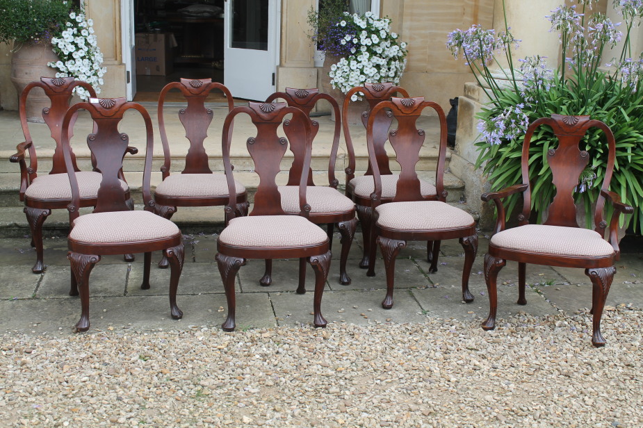 Appraisal: A set of eight reproduction George I dining chairs with