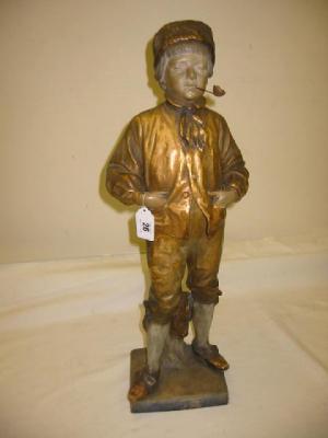 Appraisal: A GOLDSCHEIDER POTTERY FIGURE modelled as a boy smoking a