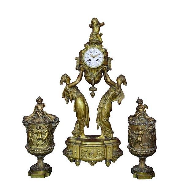 Appraisal: A French mid th Century spelter clock with cherub finial