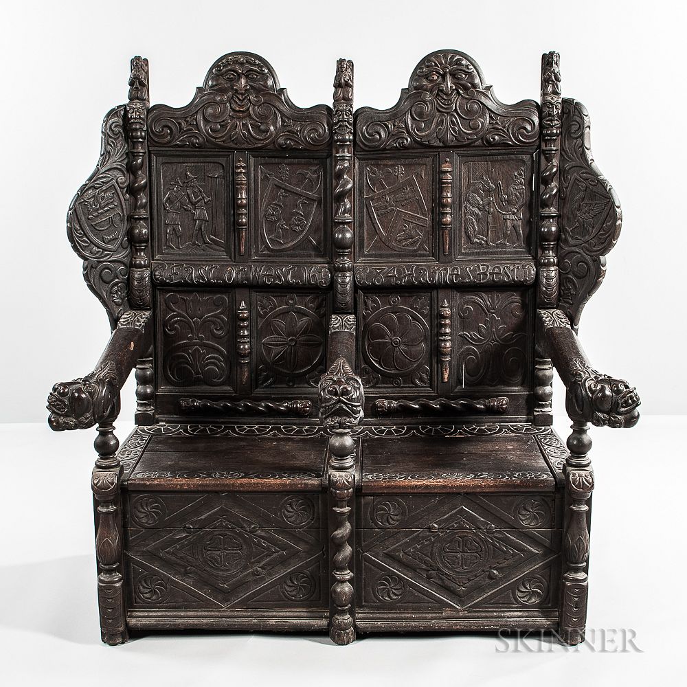 Appraisal: Jacobean-style Carved Oak Settee Jacobean-style Carved Oak Settee probably England