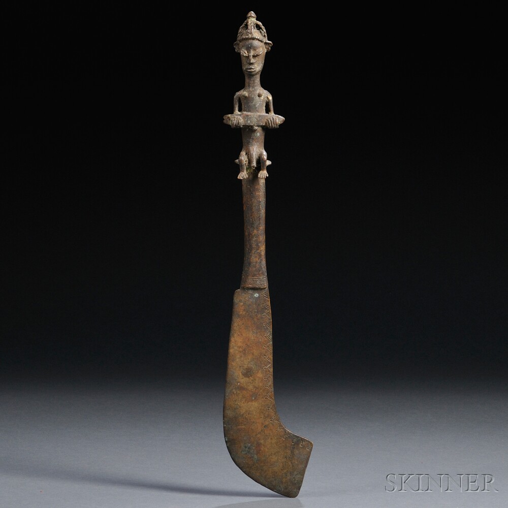 Appraisal: Yoruba Bronze Ceremonial Sword with human figure finial holding a