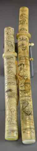 Appraisal: Japanese Carved Bone Tanto'sFinely carved with inked elements to depict