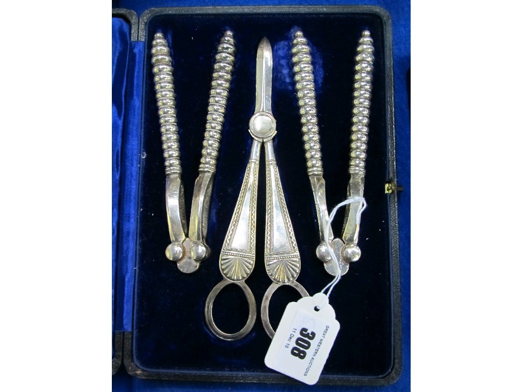 Appraisal: Cased nut cracker and grape scissor set