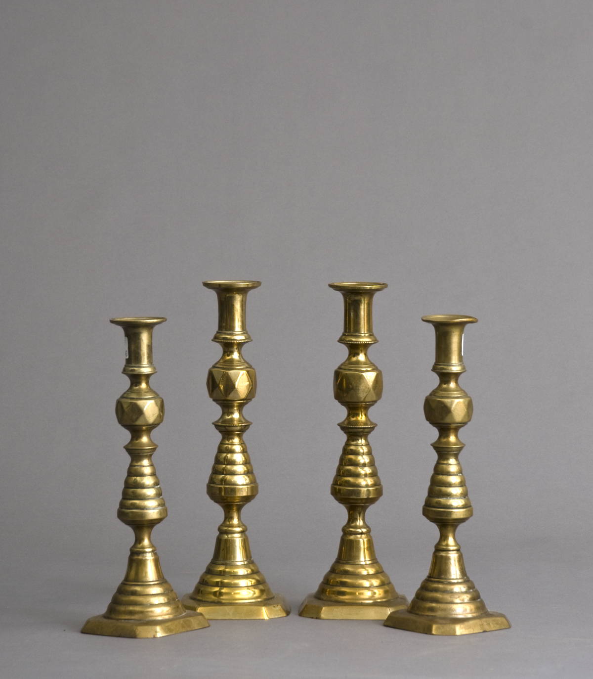 Appraisal: TWO PAIR OF BEEHIVE BRASS CANDLESTICKS Height of tallest inches