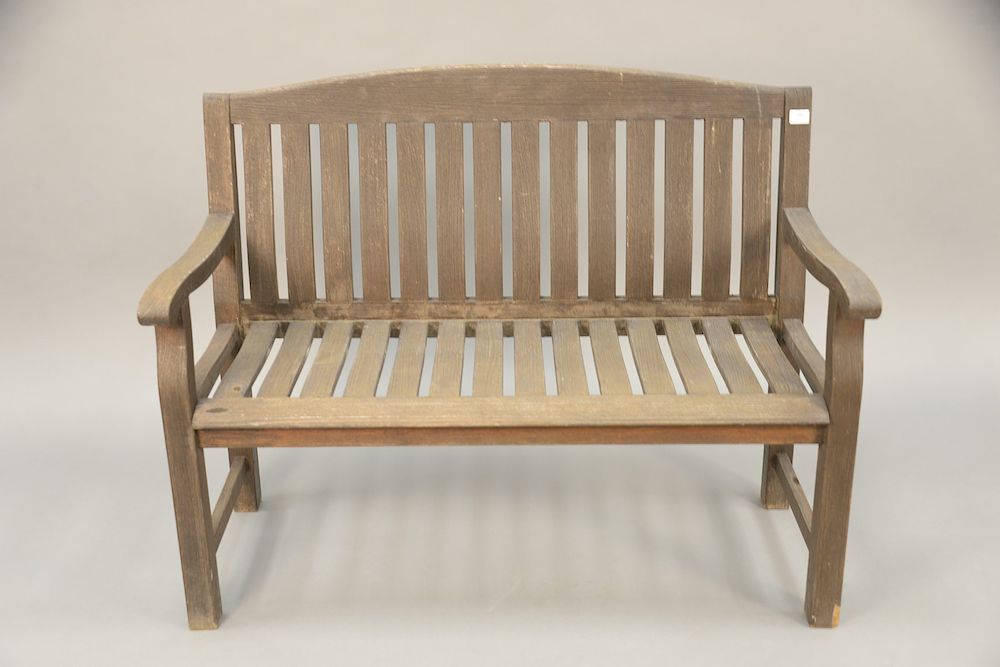 Appraisal: Teak bench with slat back lg in Teak bench with