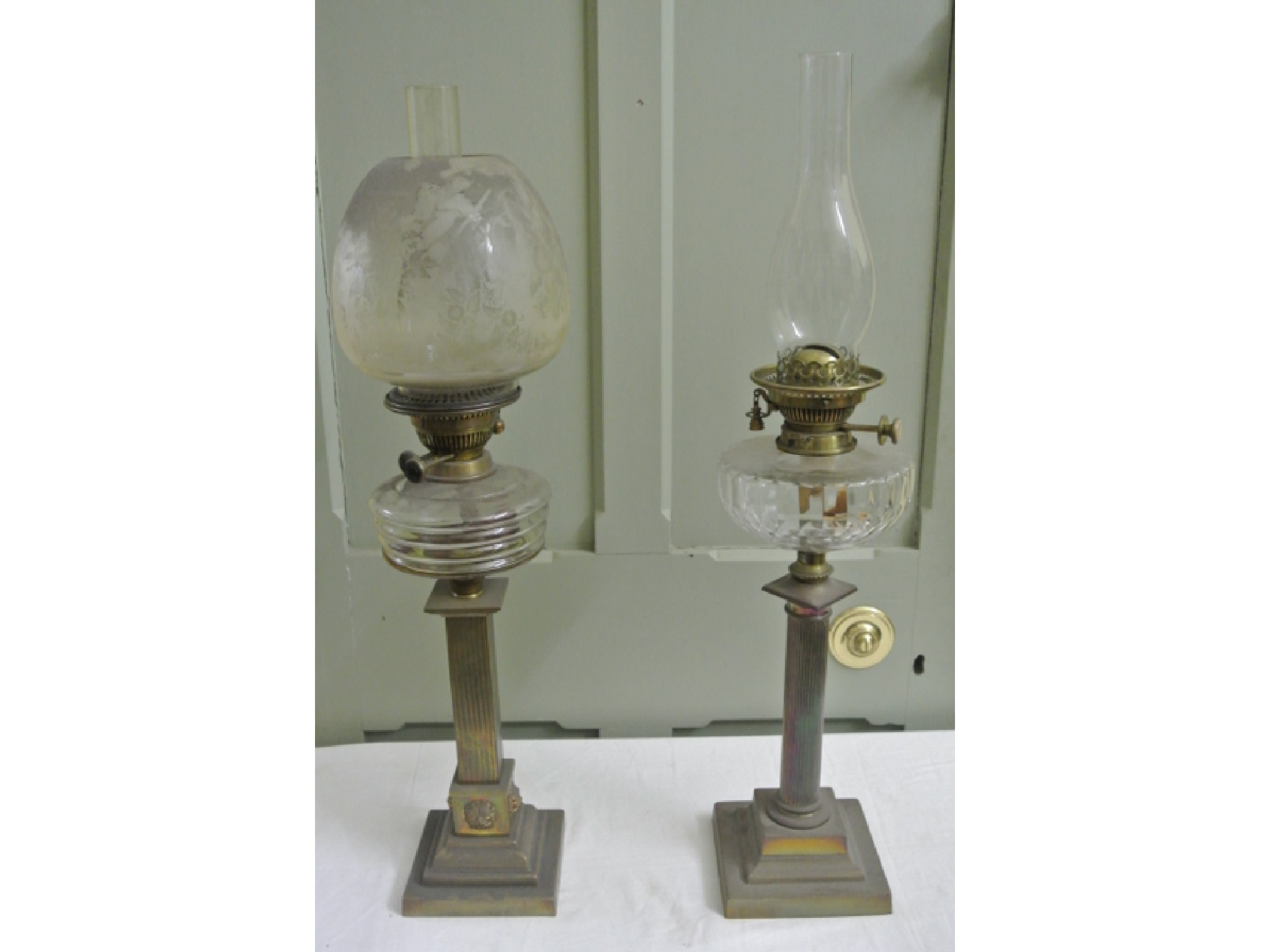 Appraisal: A Victorian brass oil lamp the square classical type column