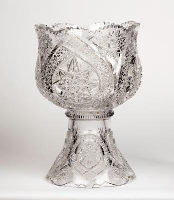 Appraisal: A large cut crystal glass punch bowl with serrated border