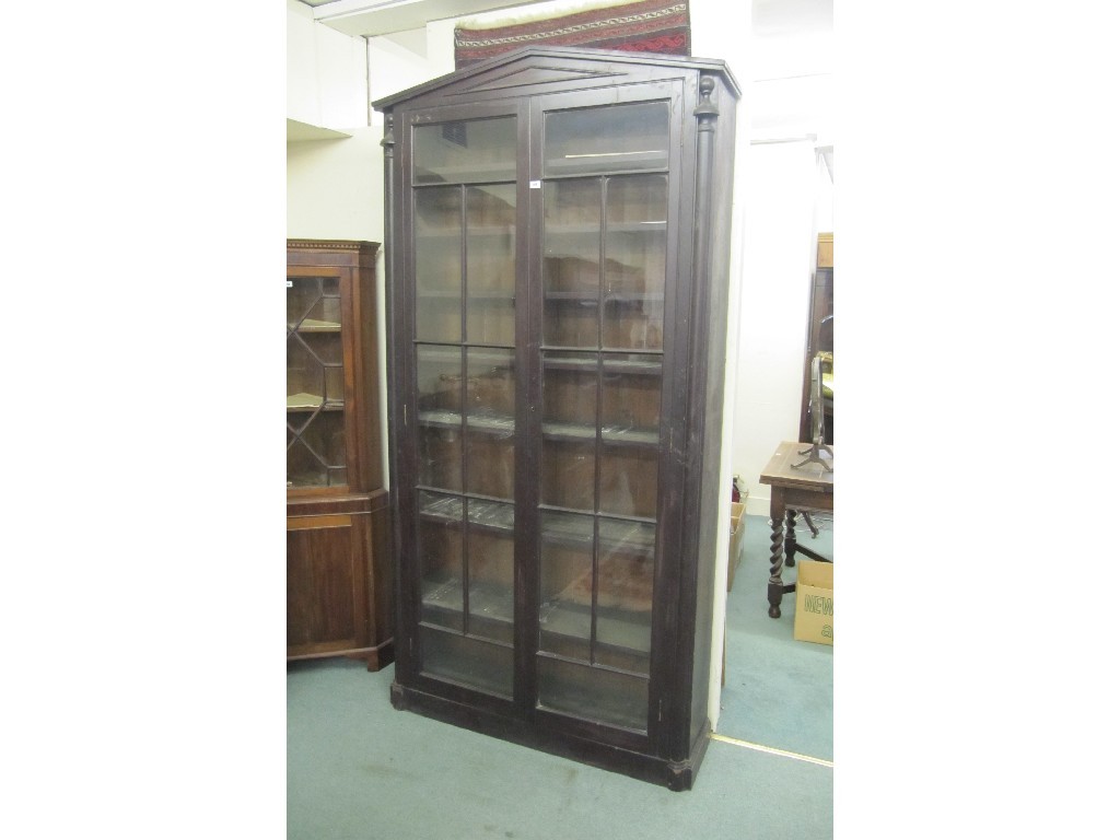 Appraisal: Early th century stained pine bookcase