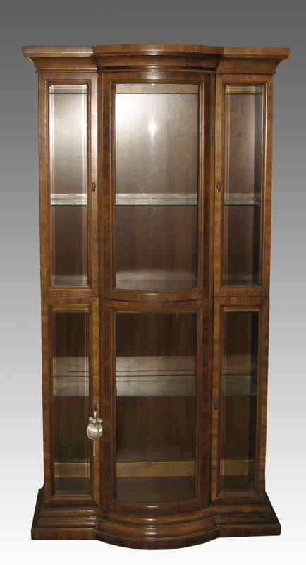 Appraisal: CONTEMPORARY CURIO DISPLAY CABINET Bowed glass center flanked by glass