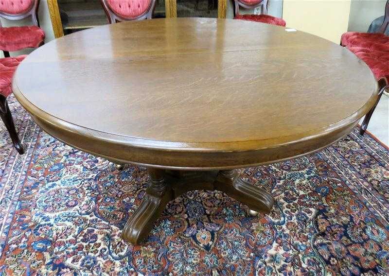 Appraisal: ROUND OAK PEDESTAL DINING TABLE WITH TWO LEAVES American c