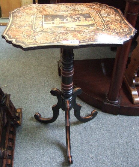 Appraisal: A pair of th century black lacquer occasional tables the