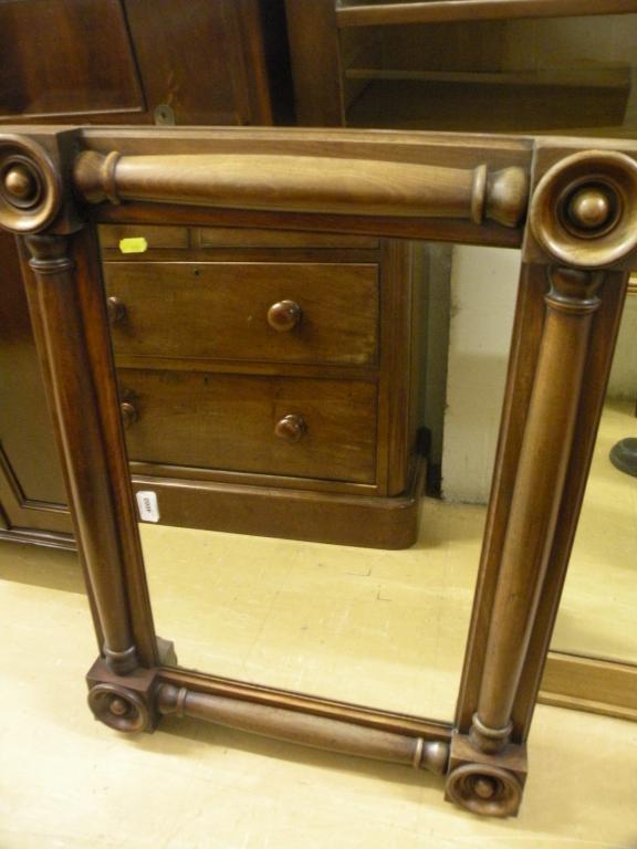 Appraisal: An early Victorian walnut over mantel mirror with turned pilasters