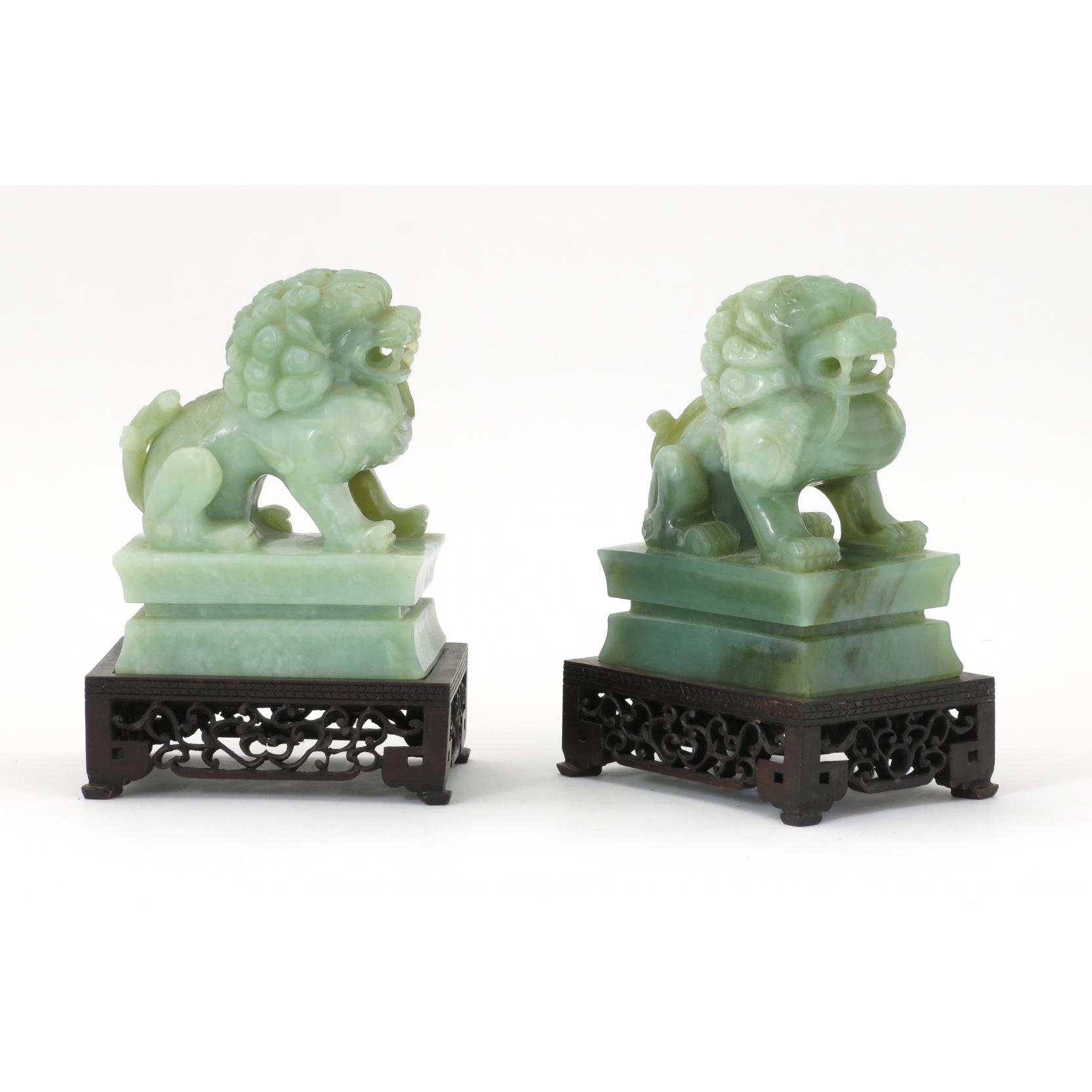 Appraisal: Pair of Jadeite Lions a pair of Asian jadeite lions