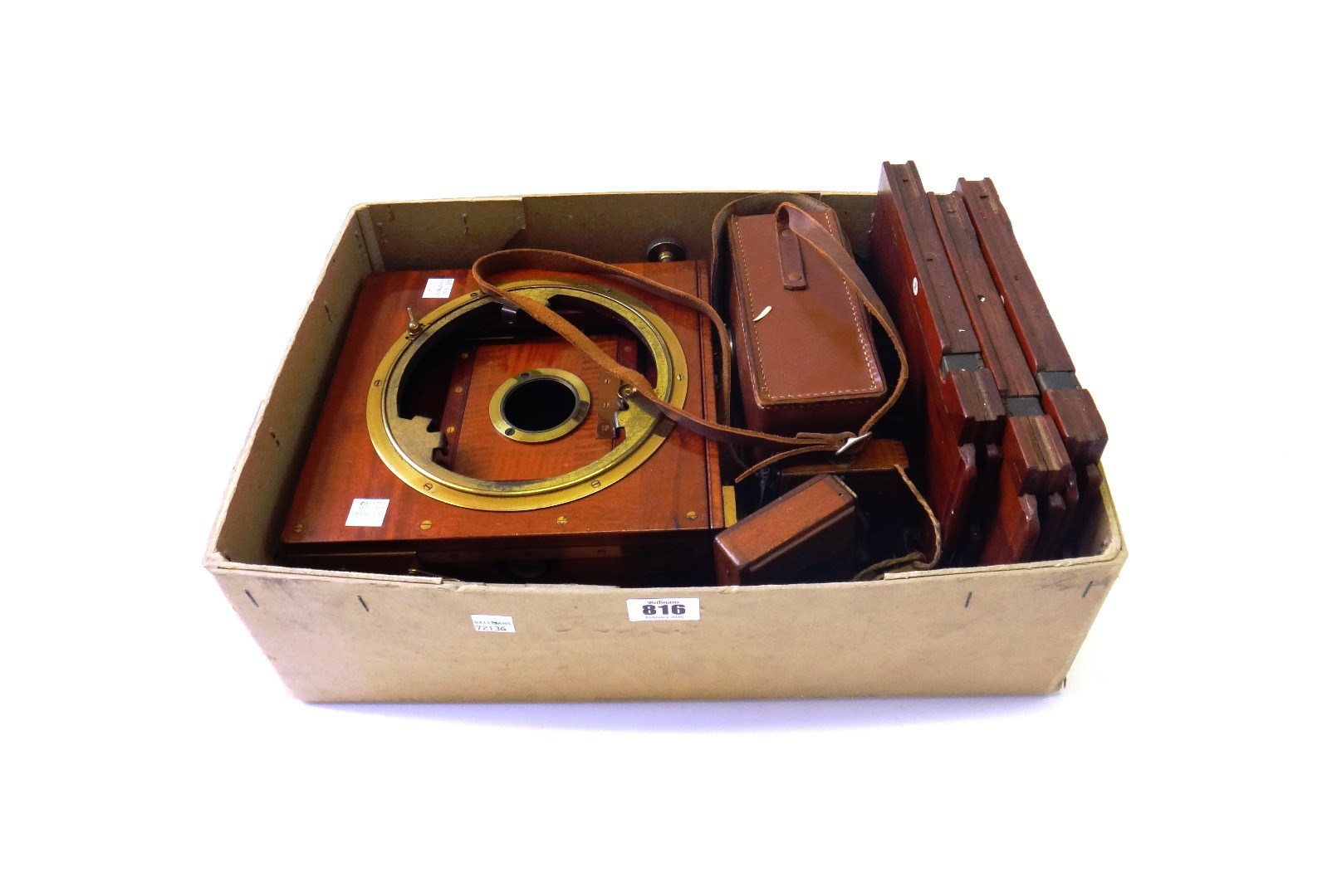 Appraisal: A Sanderson plate camera circa with three mahogany plates and