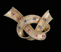 Appraisal: A Ladies' Brooch Set With Pink And Blue Stones A