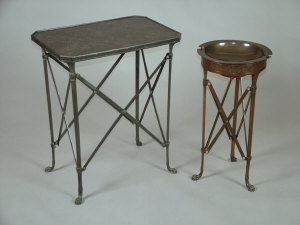 Appraisal: A patinated bronze X-frame side table th century with black