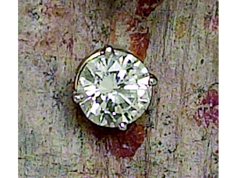 Appraisal: DIAMOND PENDANT White gold set with one round brilliant cut