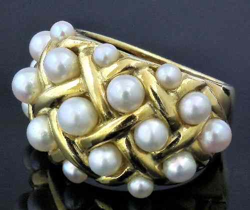 Appraisal: An ct gold and pearl mounted dress ring the lattice