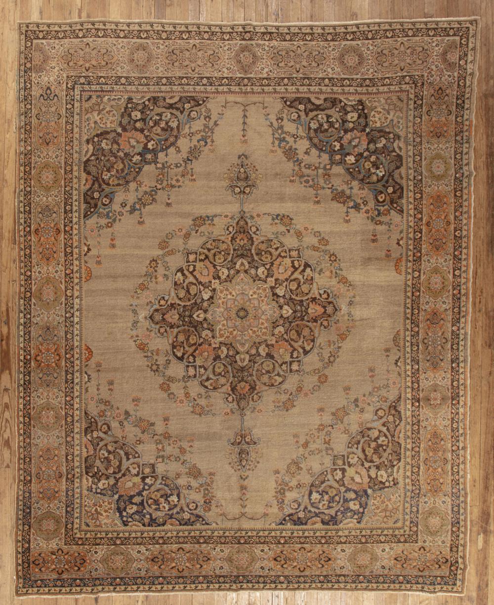 Appraisal: Antique Tabriz Carpet khaki ground central medallion and spandrels ft