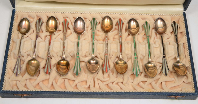 Appraisal: A SET OF TWELVE SCANDANAVIAN SILVER AND ENAMEL COFFEE SPOONS