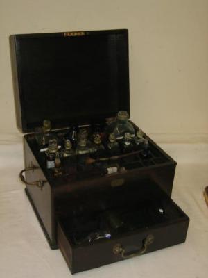 Appraisal: AN OAK MEDICINE CHEST of oblong form with brass carrying