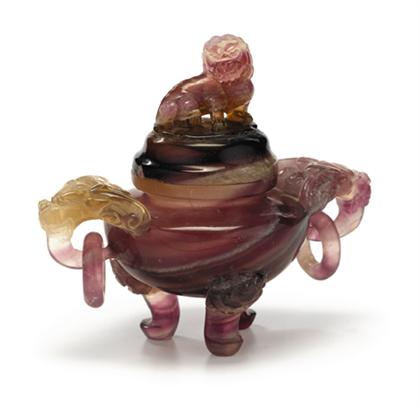 Appraisal: Chinese purple quartz covered tripod censer th century Fu-lion surmounted