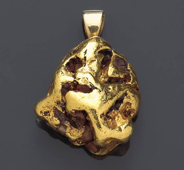 Appraisal: A gold nugget pendant gold with matrix bail in k