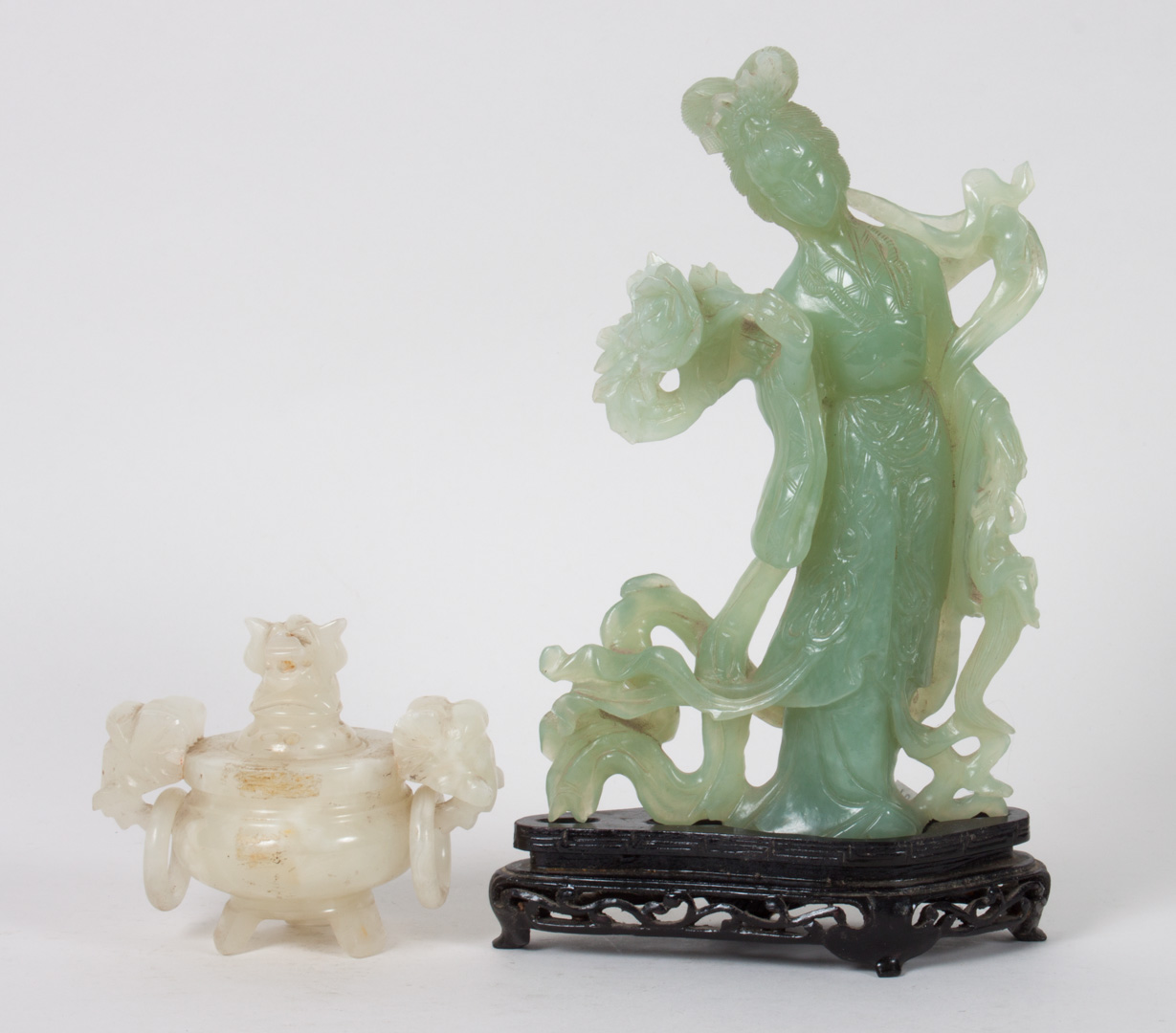 Appraisal: Chinese carved jade Quan-Yin and censor green jade Quan-Yin figure