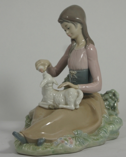 Appraisal: Lladro Figure of a Girl Feeding a Lamb