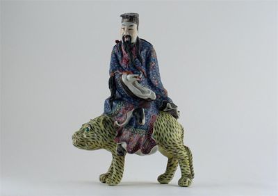 Appraisal: A Chinese famille rose model of a scholar seated on